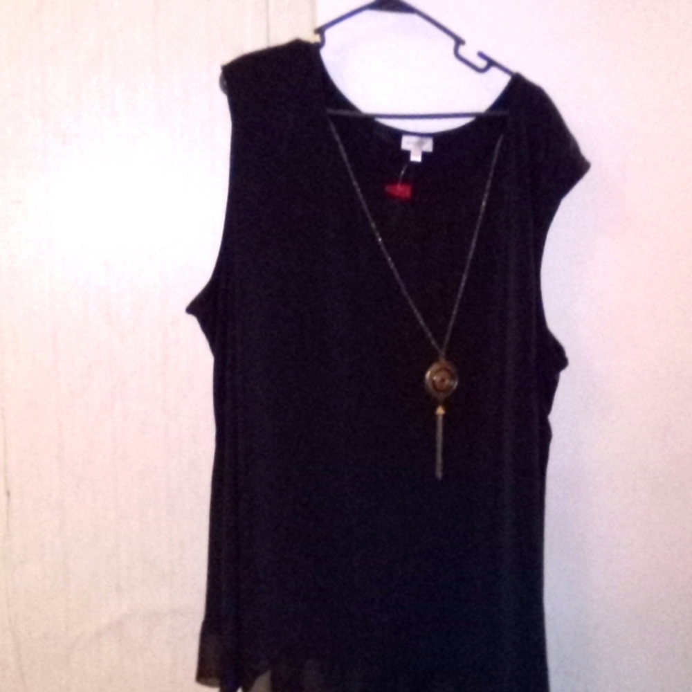 Black sleeveless blouse  size 30/32  with a necklace attached  never worn